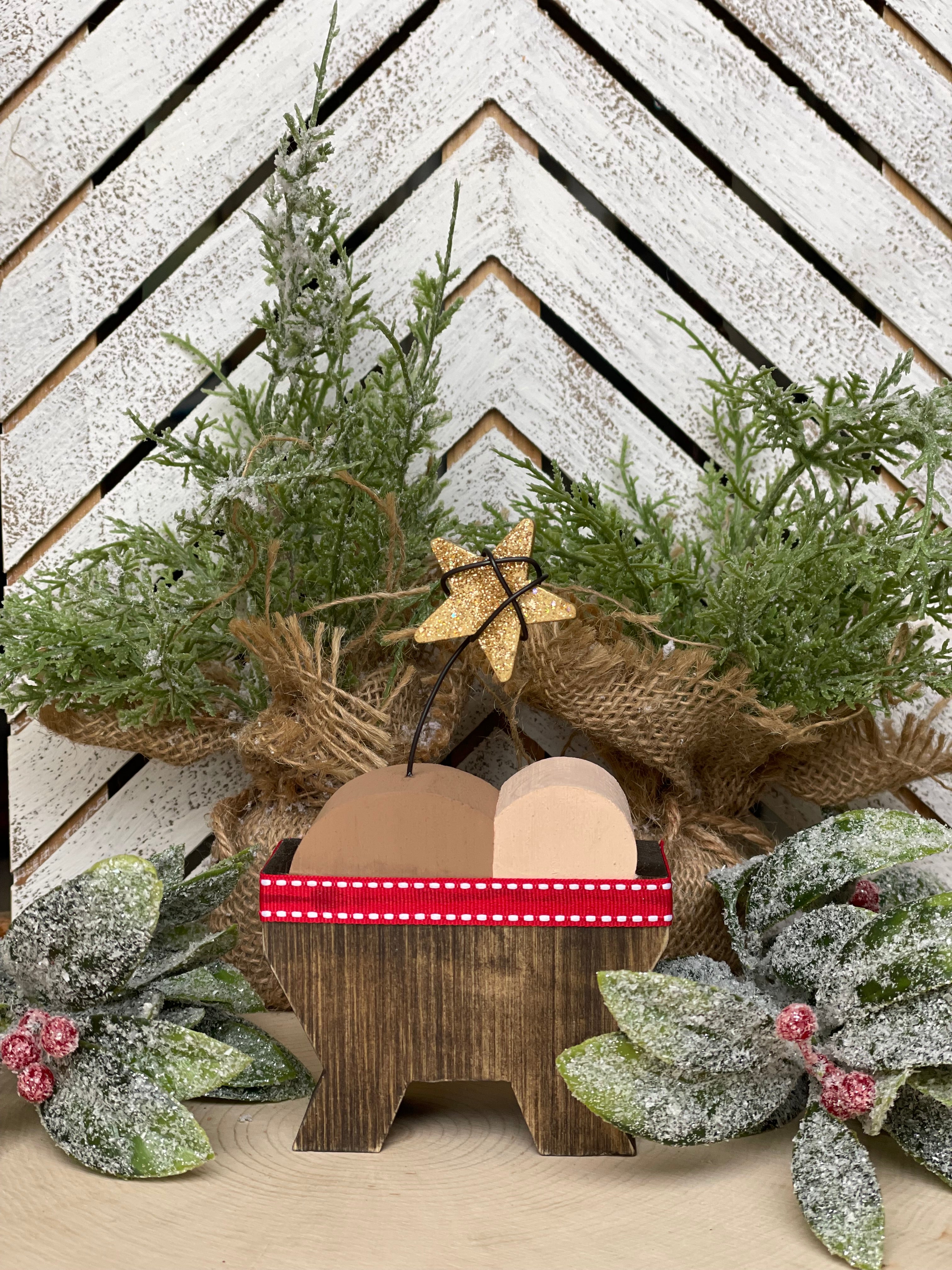 Red Baby Jesus with glitter star